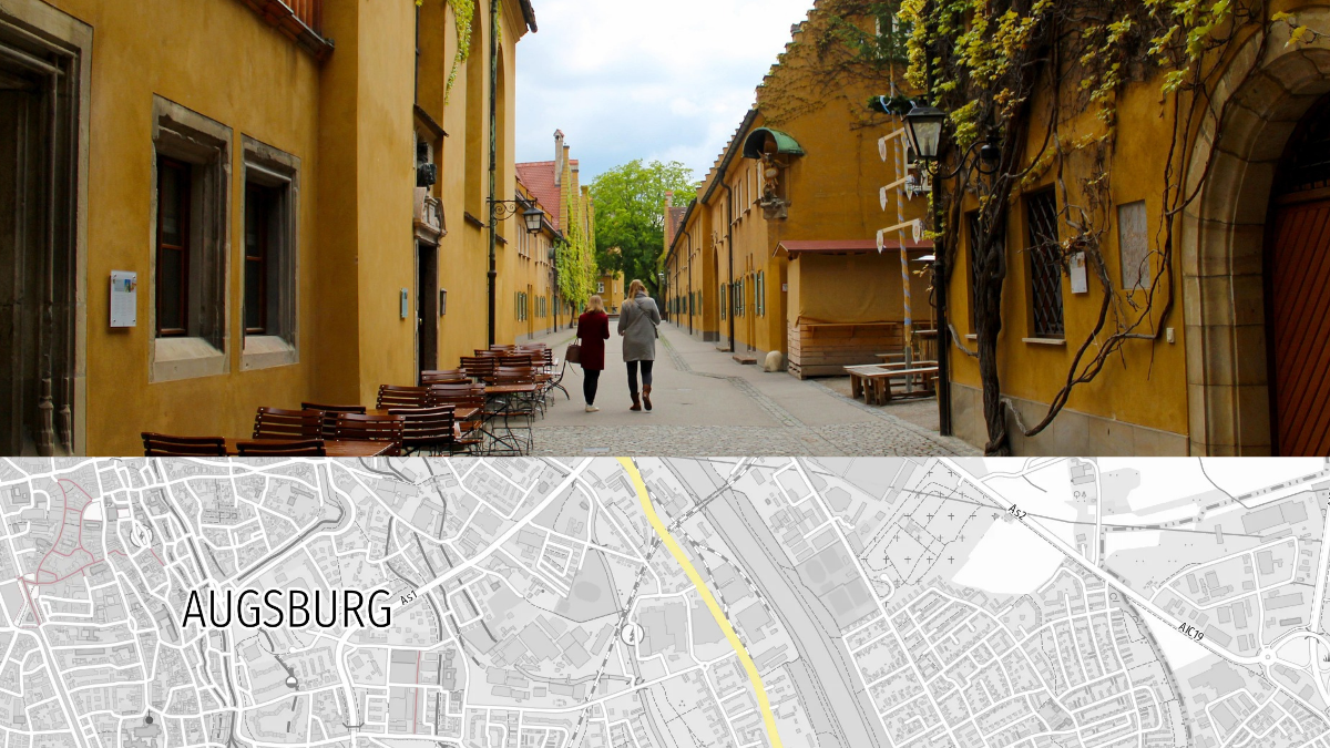 Straße mit gelben Häusern und grauer Karte